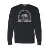 Long sleeve funny retirement camping shirt featuring Does This Shirt Make Me Look Retired text with vintage camper trailer, pine trees, and crescent moon graphic